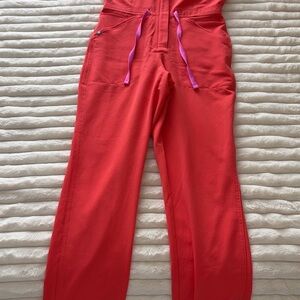 Figs Red Jumpsuit with Purple Accents